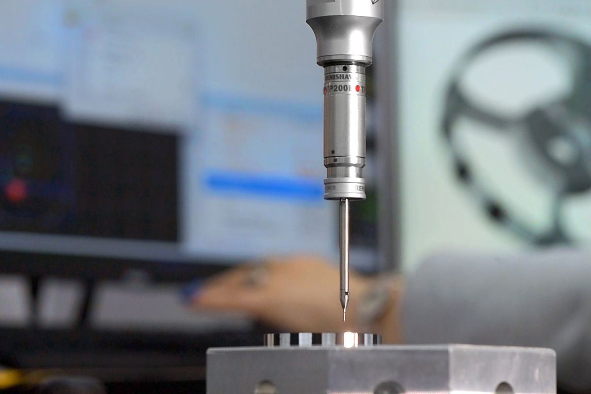 Touch probe checking dimensions during in process inspection